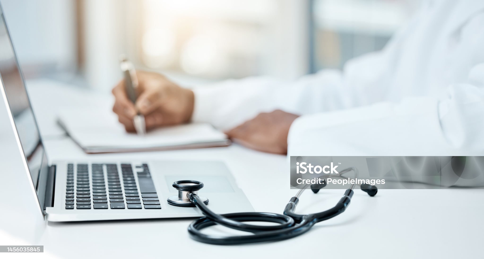 Doctors working with AI tools in a modern clinic